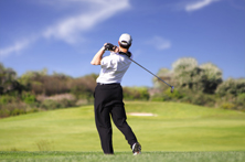 Man Posing After Hitting a Golf Shot