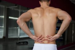 man suffering from pain in lower back