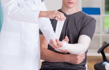 Man Getting an Arm Cast