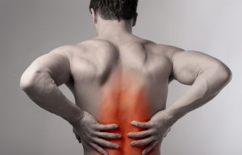 Man suffering from discogenic pain.