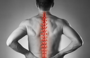 man with marked spine