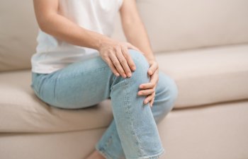 woman having knee ache and muscle pain due to Runners Knee or Patellofemoral Pain Syndrome, osteoarthritis, arthritis, rheumatism and Patellar Tendinitis. medical concept